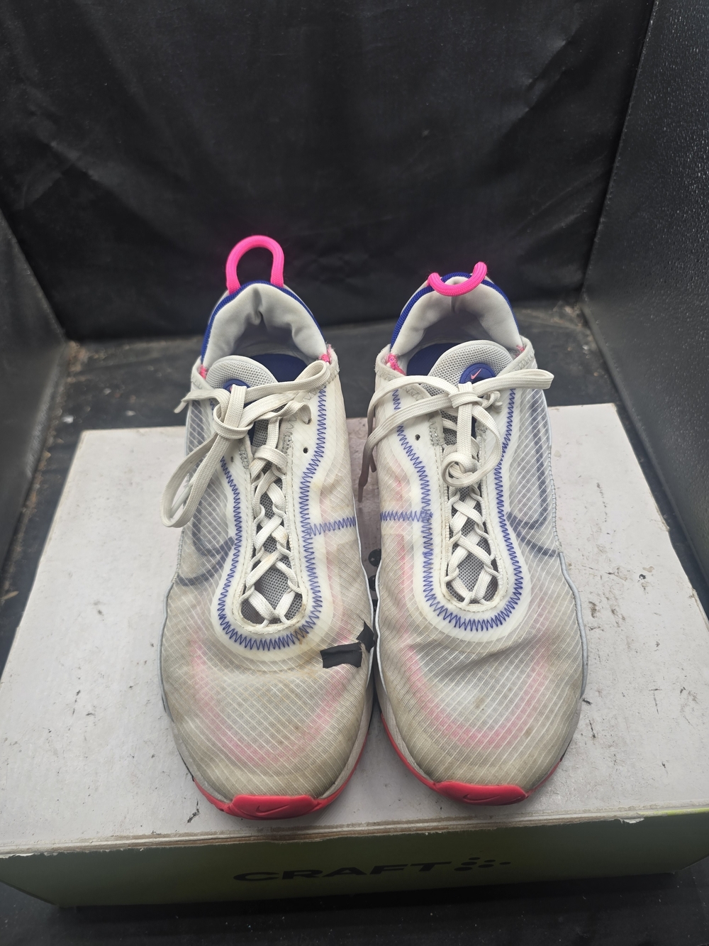 Nike White Athletic Shoes with Pink and Blue Accents